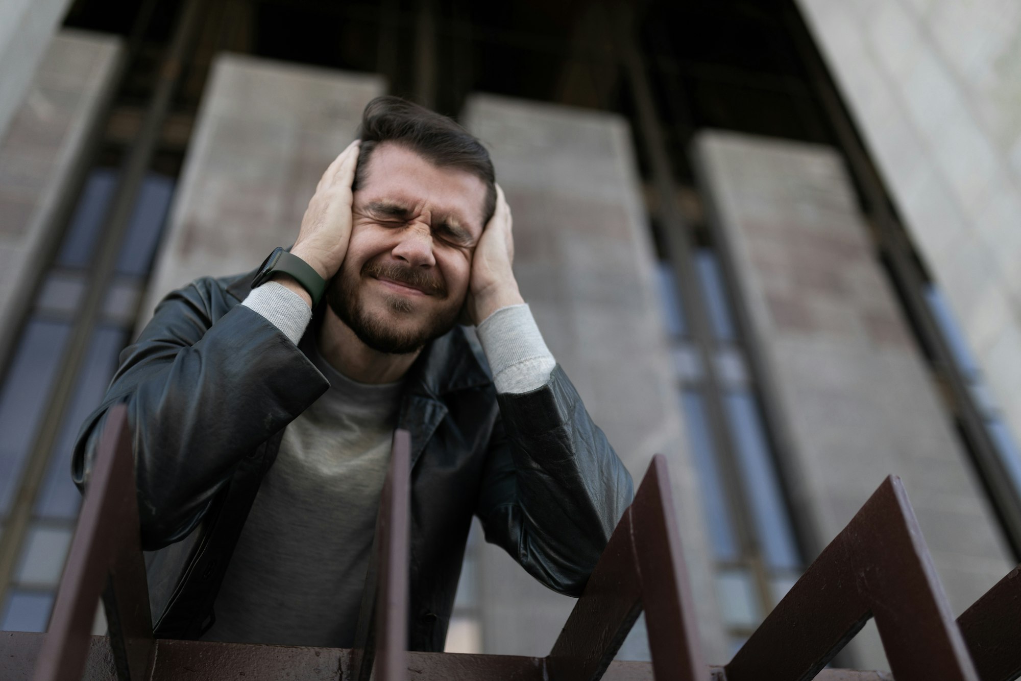 portrait of a man in the moment of panic attacks